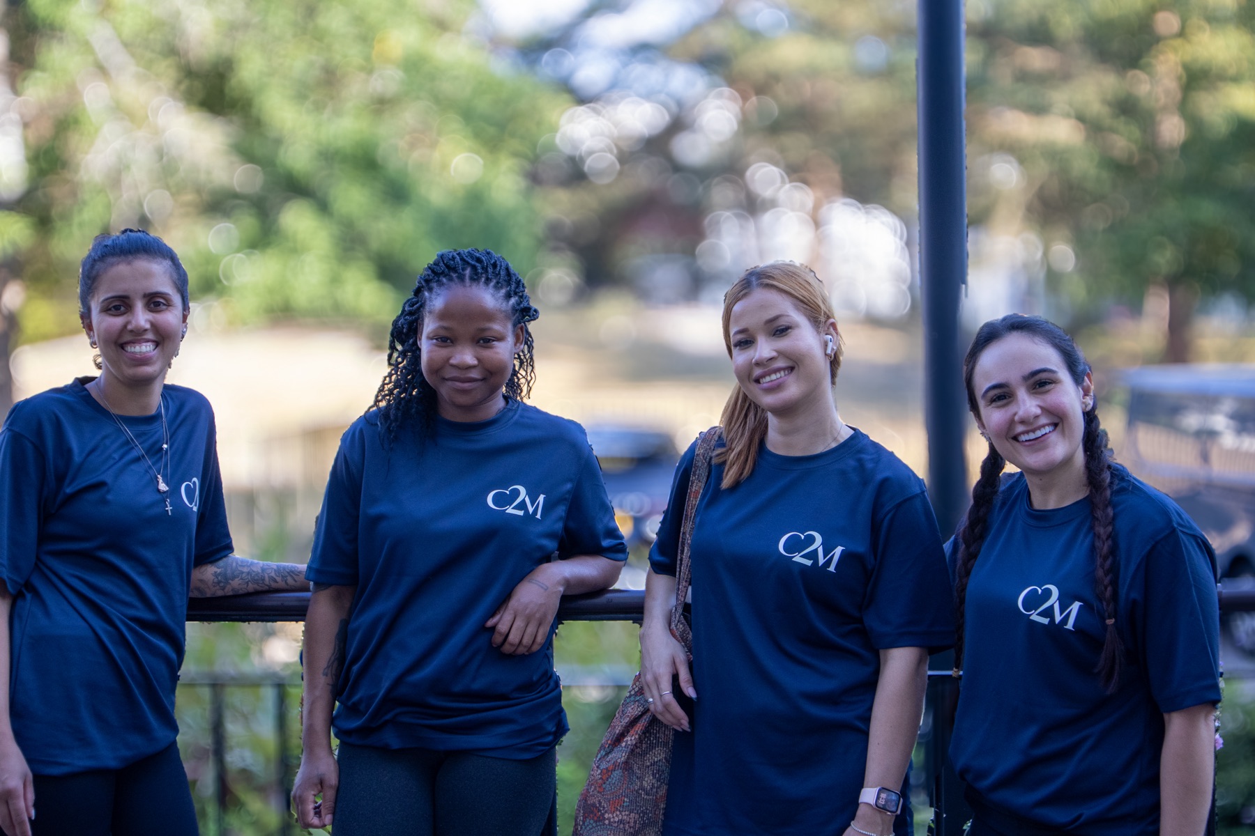 The Cleaners2Match team smiling together outdoors